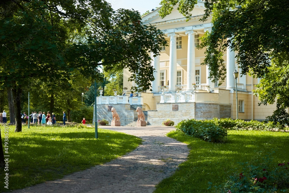Wedding palace in summer time with trees on foreground Wedding palace in summer time with trees on foreground