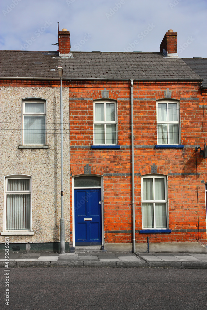 Houses in Derry, Irland, blue door, brickhouse Houses in Derry, Irland, blue door, brickhouse