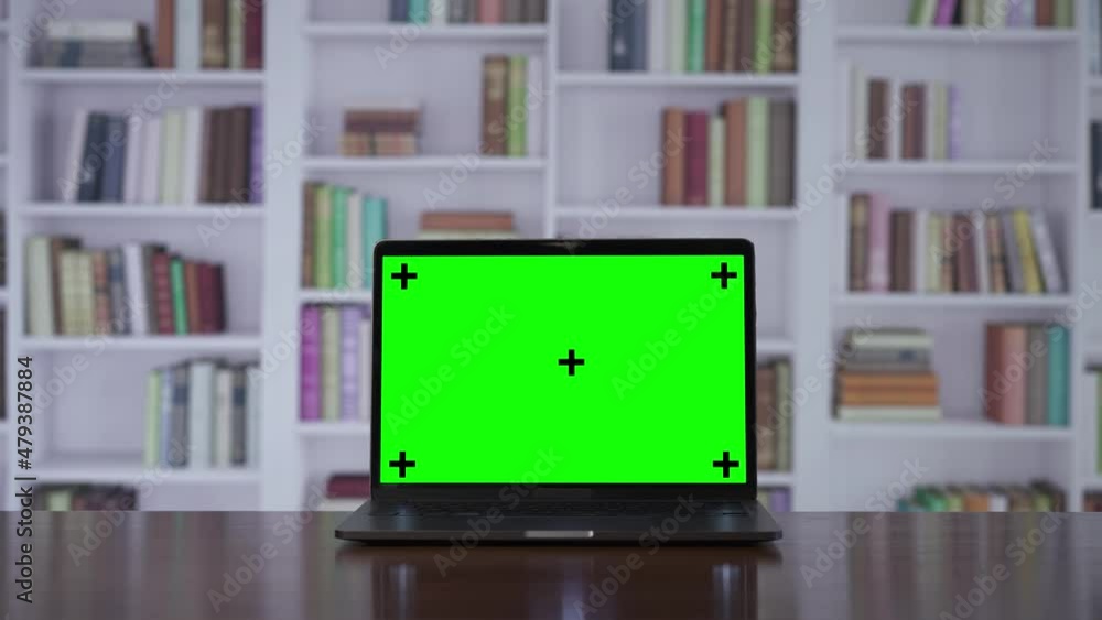 Copy space template zoom in close up shot of modern laptop with chroma key green screen set up for work in home or office concept. Copy space template zoom in close up shot of modern laptop with chroma key green screen set up for work in home or office concept.