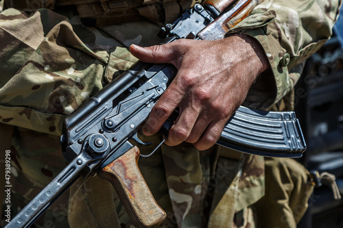 Hands and chests of soldiers in uniforms with machine guns.mashine gun ak - 47 - kalashnikov