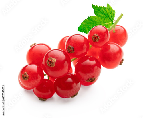 Red currant berries with leaf isolated on white background. Clipping path.