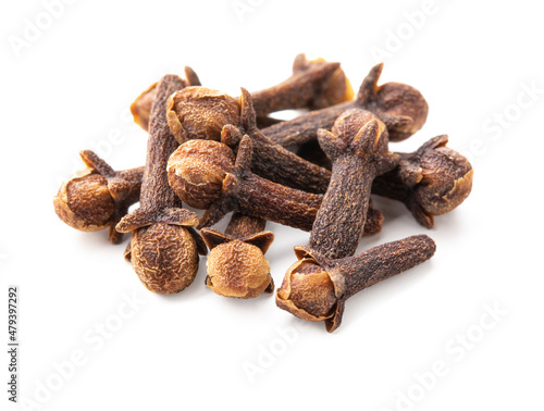 Pile of dry cloves isolated on white background.