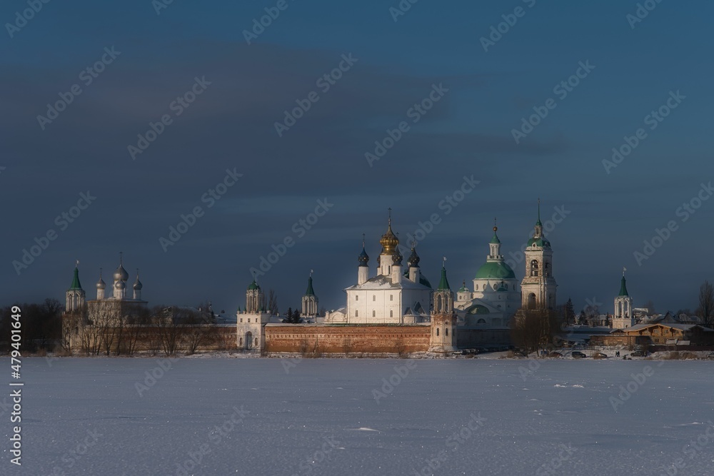 Temples of the sity of Rostov the Great on the shore of the lake in winter