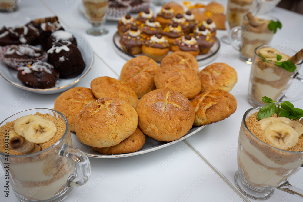 assorted cookies and cakes on white table
