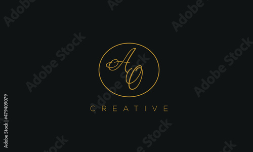 AO is a stylish logo with a creative design and golden color with blackish background.