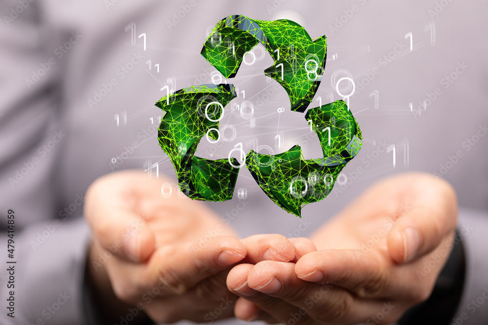 hand holding green recycle symbol hand holding green recycle symbol