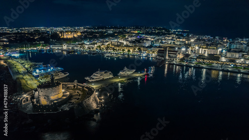 Aerial drone view of Rhodes town center during night