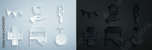 Set Fast street food cart with awning, Corn dog, Attraction carousel, Unicycle one wheel bicycle, Hand holding playing cards and Carnival garland flags icon. Vector
