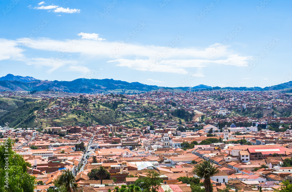 panoramic view of red tile roofs and white walls buildings at sucre white city in bolivia