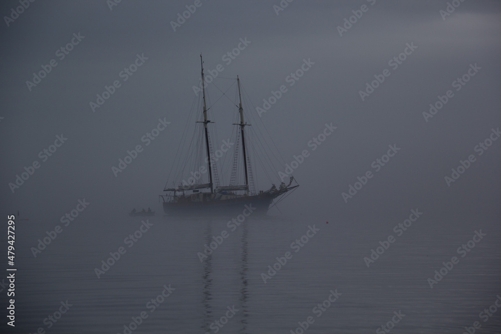 Ship on a foggy morning, ghost ship in fog