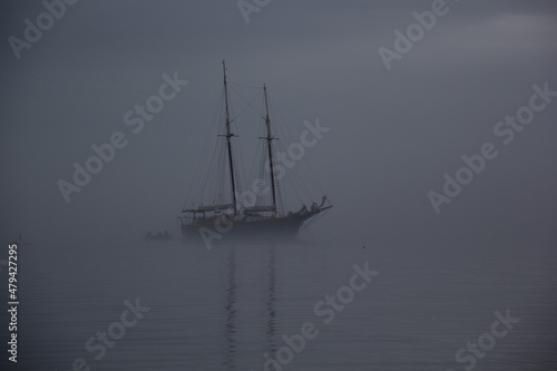 Obraz na płótnie Ship on a foggy morning, ghost ship in fog w salonie