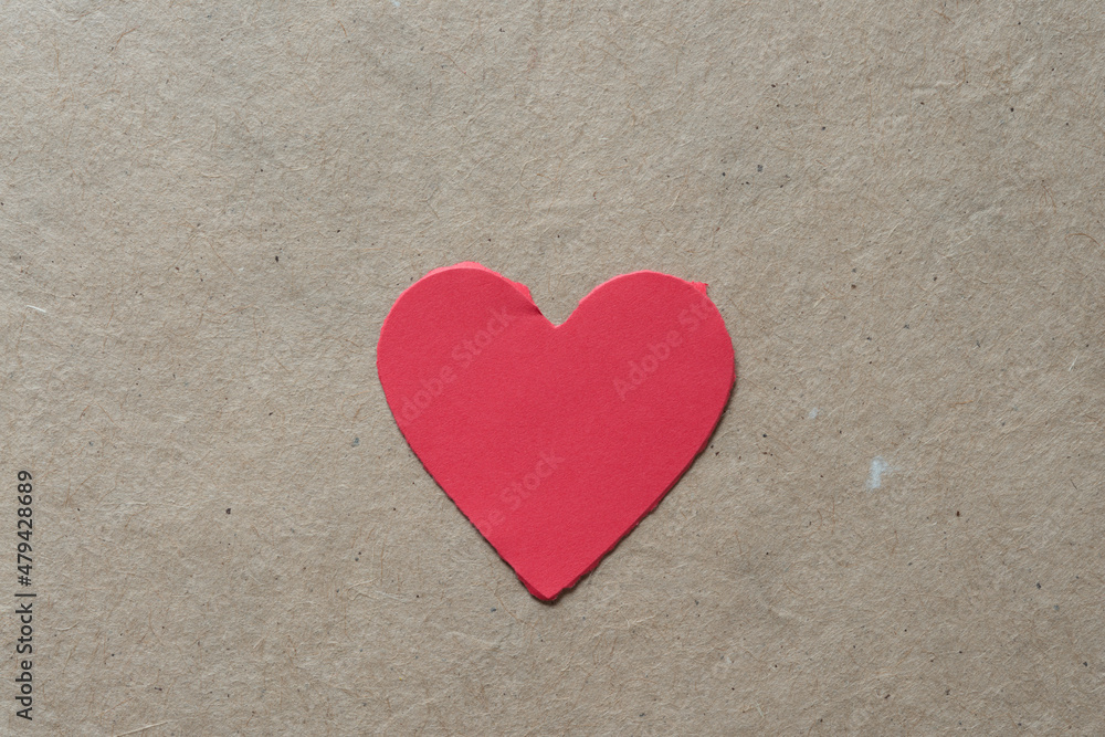 torn paper heart on cardboard torn paper heart on cardboard