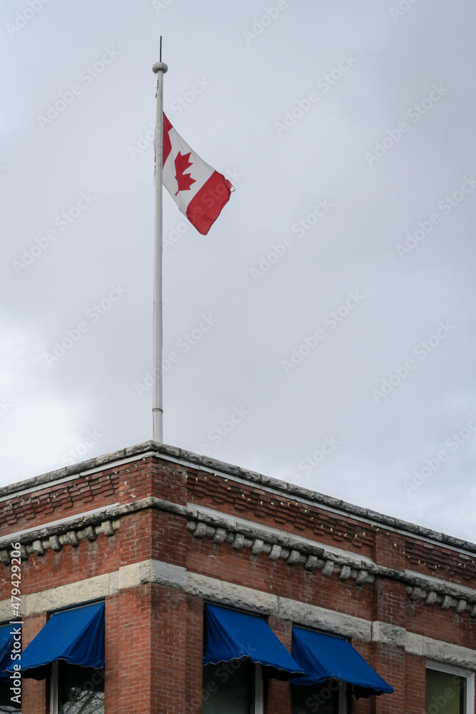 canadian flag on a building in Nelson