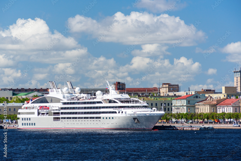 White motor ship on the Neva river in the city of St. Petersburg..