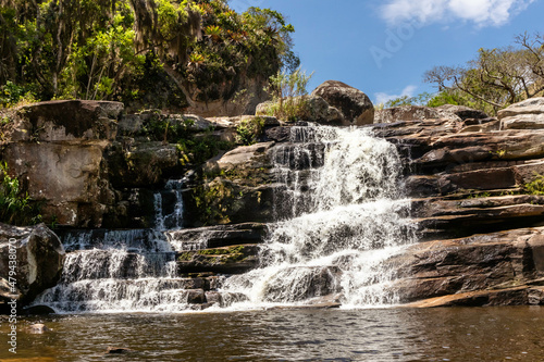 Big Waterfall dos Frades, over stone slabs forming a bathing well, Teresopolis, Rio de Janeiro, Brazil photo
