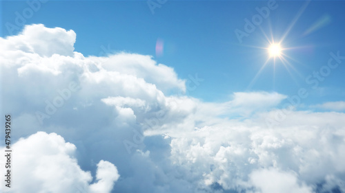 Aerial View Above the Clouds with Shining Sun