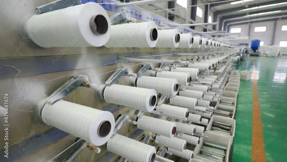 High speed rotating plastic weaving machinery is in a production workshop in North China High speed rotating plastic weaving machinery is in a production workshop in North China
