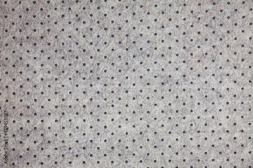 Surface of felted polyester fabric texture with plastic dots