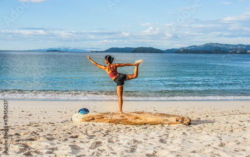 Yoga on Playa Conchal, a beach made of seashells, Guanacaste, Costa Rica photo