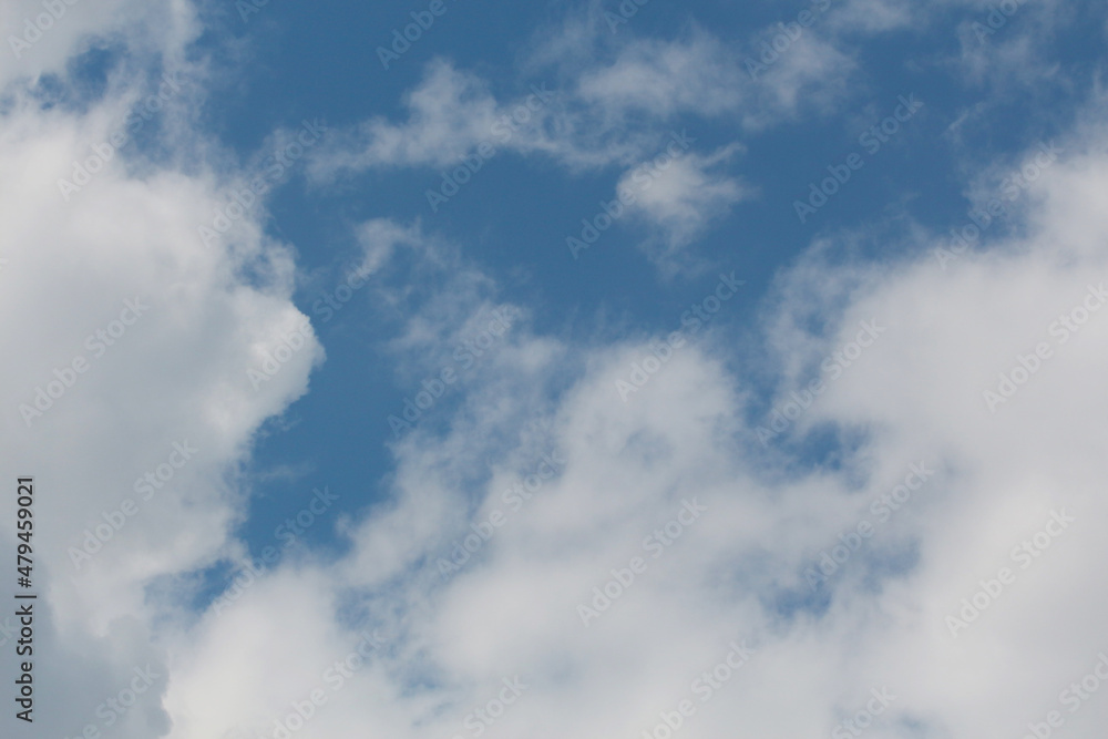 Blue sky with white clouds in the daytime background. Blue sky with white clouds in the daytime background.