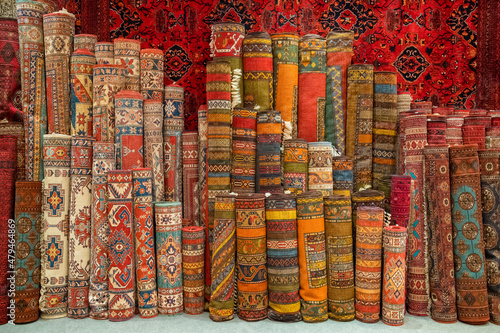 Variety of the gorgeous oriental carpets in traditional carpet store in Middle East