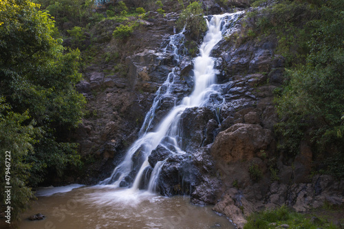 Waterfall with clear water in Los Filtros Viejos Park at Morelia, Michoacan, Mexico. Long exposure photography