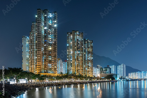 High rise residential building in Hong Kong city at night