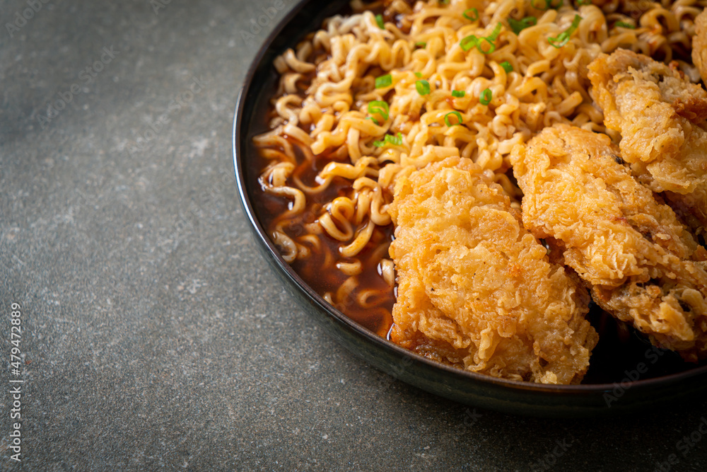 Korean instant noodles with fried chicken or Fried chicken ramyeon Korean instant noodles with fried chicken or Fried chicken ramyeon