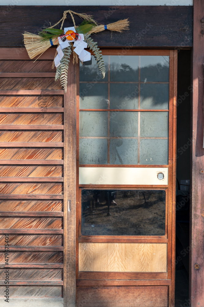 "Shimenawa", a sacred festoon decorated at main entrance of Japanese