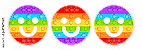Emoji smile face . Rainbow popular popit toy shaped as an emoticon.  Pop it sensory vector toy. Bubble pop it fidget vector. Popit fidget toy.