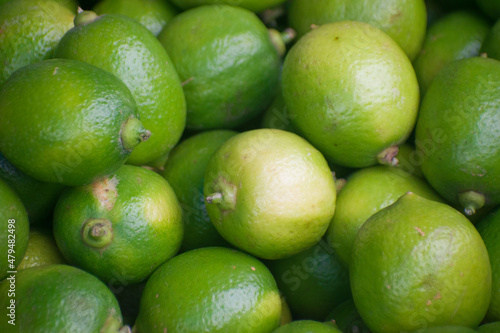 Lime Citrus Fruits In Market.Citrus limon. It is a species of small evergreen tree in the flowering plant family Rutaceae, native to Asia.