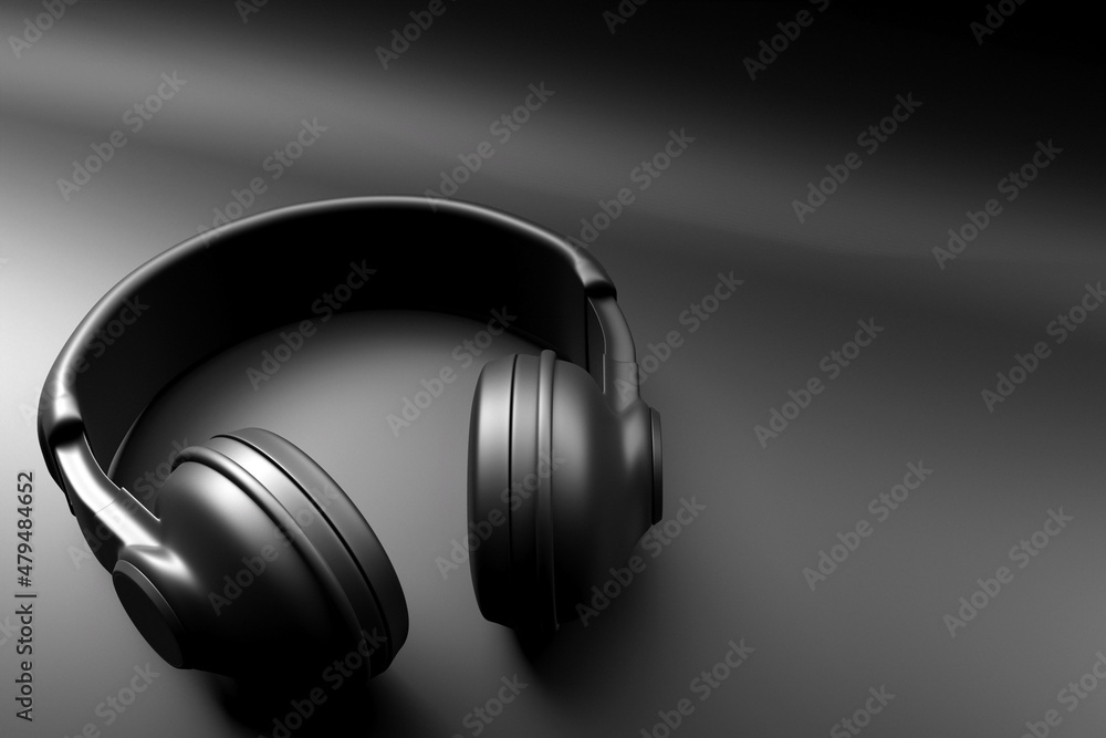 3d illustration of black retro headphones  on  black  isolated background on white lights. Headphone icon illustration