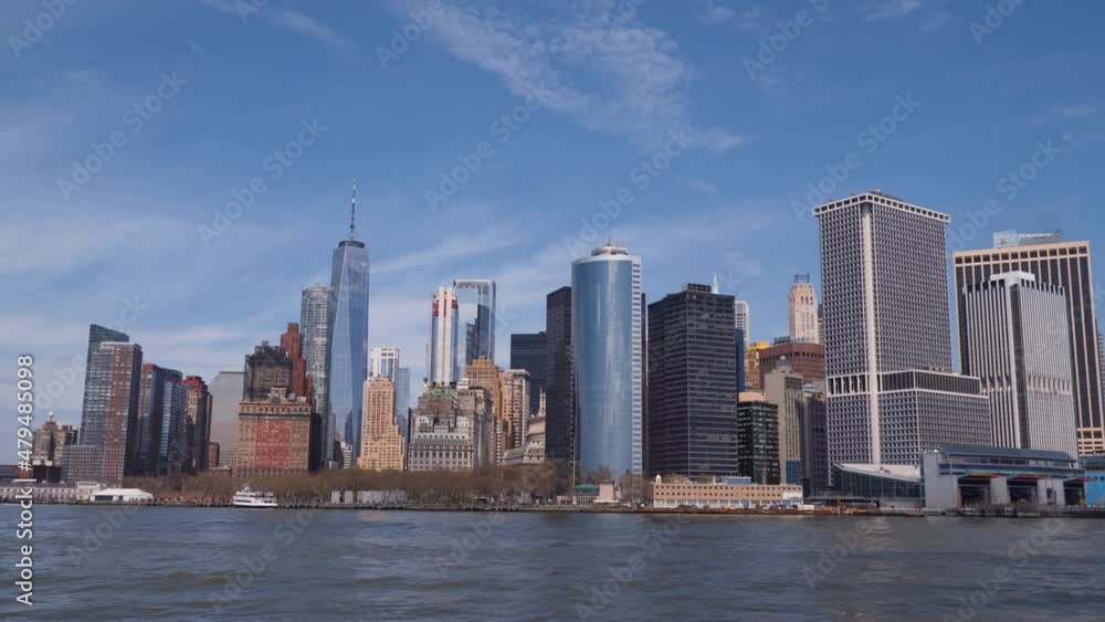 New York, Manhattan skyline with many skyscrapers shot from the Hudson river New York, Manhattan skyline with many skyscrapers shot from the Hudson river