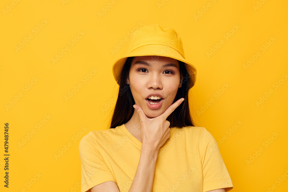 woman casual wear studio hand gesture yellow background unaltered woman casual wear studio hand gesture yellow background unaltered