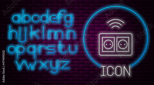 Glowing neon line Smart electrical outlet system icon isolated on brick wall background. Power socket. Internet of things concept with wireless connection. Neon light alphabet. Vector