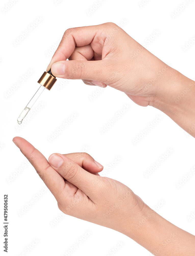 Hand holding Skincare serum dropper bottle isolated on white background. Hand holding Skincare serum dropper bottle isolated on white background.