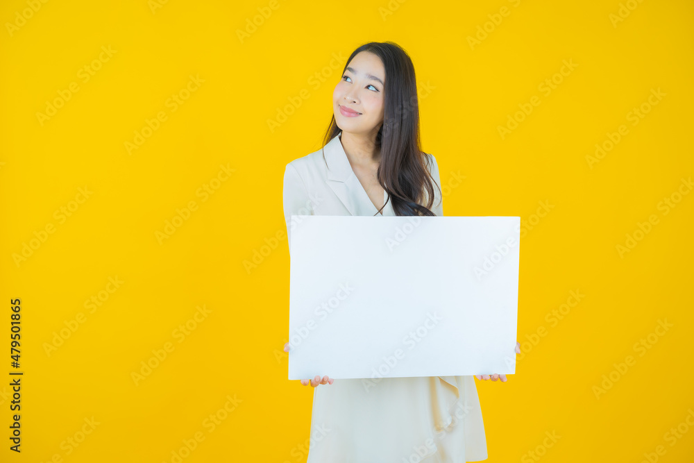 Portrait beautiful young asian woman with empty white billboard Portrait beautiful young asian woman with empty white billboard