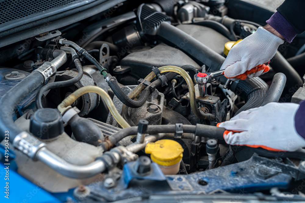 the owner of an expensive car brought his own car for repair in a car service with repair. the owner of an expensive car brought his own car for repair in a car service with repair.