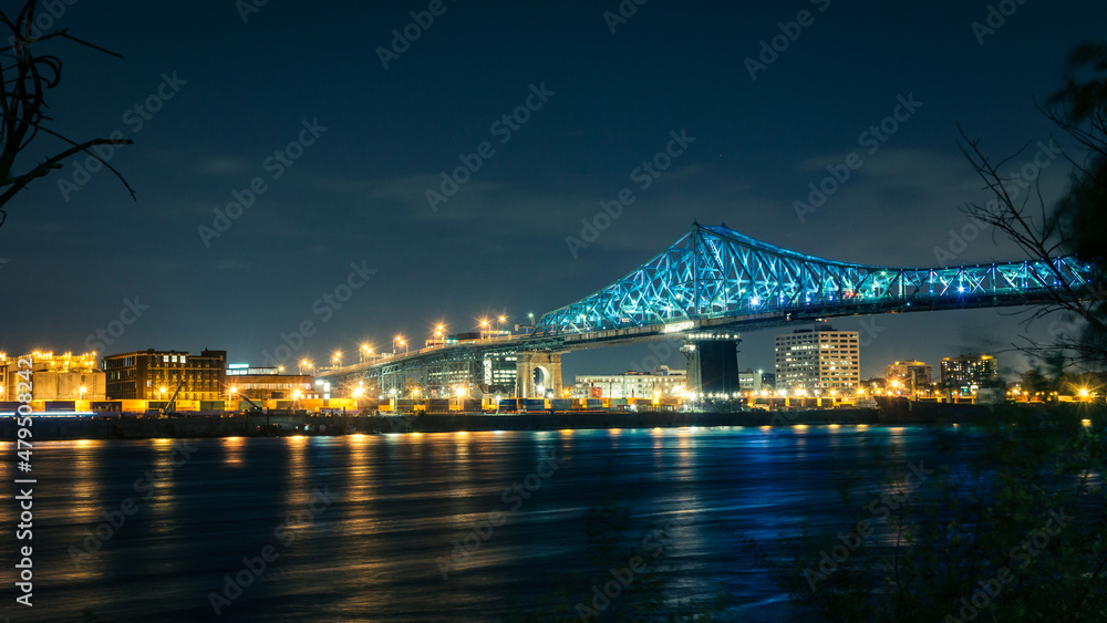 View on Montreal skyline, Molson factory and Jacques Cartier bridge by night from the St Helen island