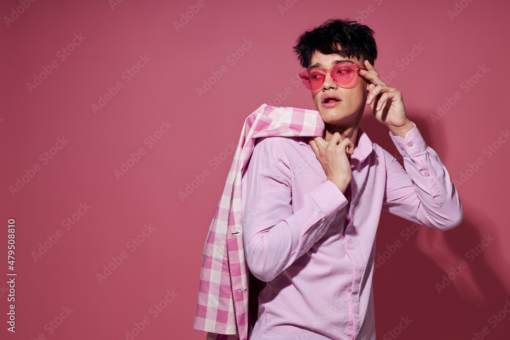 Fototapeta premium handsome guy plaid blazer pink glasses fashion modern style isolated background unaltered