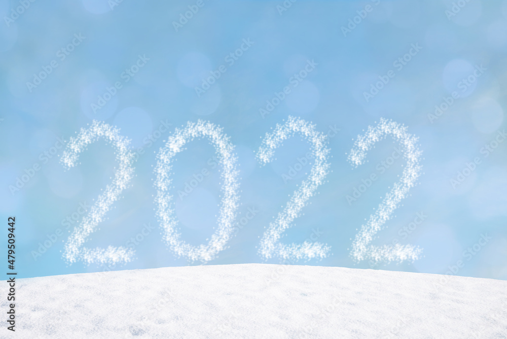 wintry background with flares and snowy hill, year 2022 wth snowflakes wintry background with flares and snowy hill, year 2022 wth snowflakes