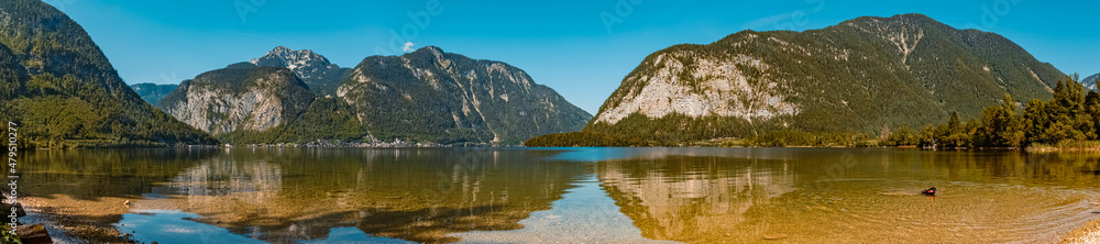 High resolution stitched panorama with reflections at the famous Hallstaetter See lake, Hallstatt, Upper Austria, Austria