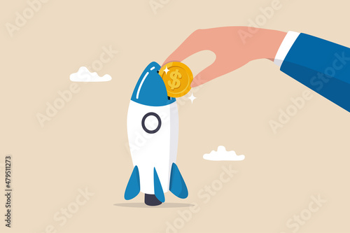 Funding startup company or venture capital investment, cost or budget to new business, pay for project launch concept, businessman hand investor put money coin into innovative rocket to launch company