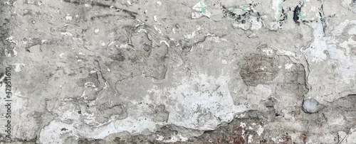 Fototapeta Postarzana, stara pionowa uliczna ściana z teksturą pęknięć. Panorama, tło, tapeta.