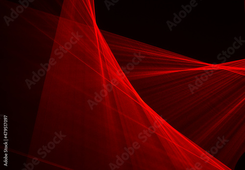 Abstract red lines drawn by light on a black background