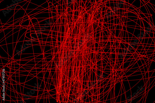 Abstract red lines drawn by light on a black background