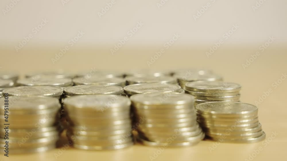 Gold Coin Stacks, Close Pan Shot With Close Depth of Field Gold Coin Stacks, Close Pan Shot With Close Depth of Field