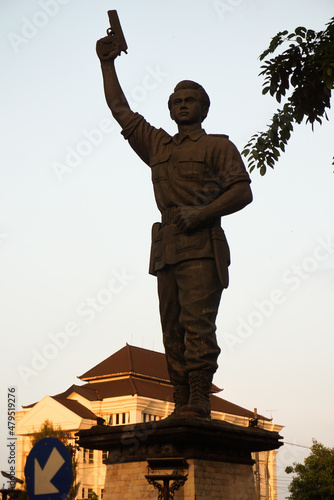 Surakarta, Indonesia – December 20, 2021: Gladak Statue or the Slamet Riyadi Statue is a form of appreciation to Captain Slamet Riyadi in the city of Solo in the afternoon. Jalan Tugu Slamet Riyadi