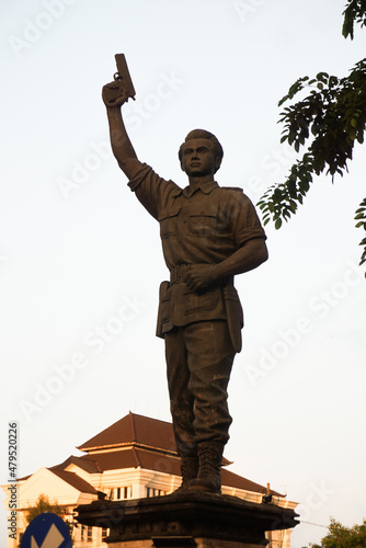 Surakarta, Indonesia – December 20, 2021: Gladak Statue or the Slamet Riyadi Statue is a form of appreciation to Captain Slamet Riyadi in the city of Solo in the afternoon. Jalan Tugu Slamet Riyadi