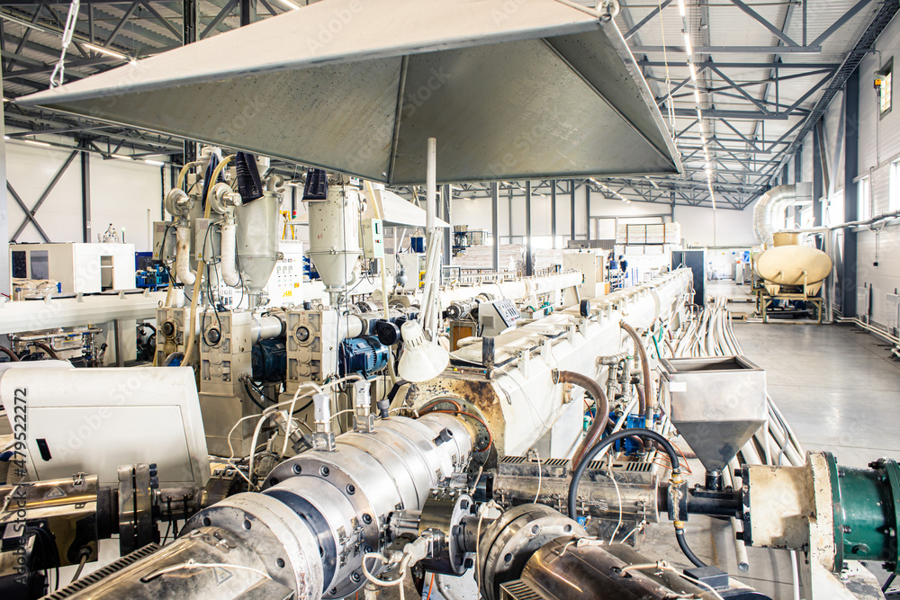Inside factory. the interior of the equipment used in the polypropylene pipe production line